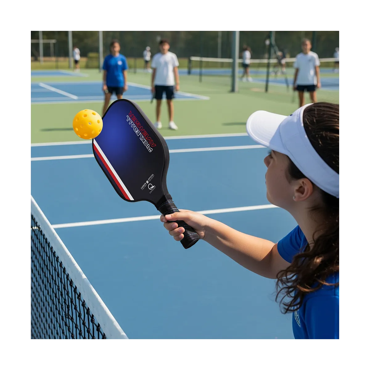 Racchetta pickleball Avenger di Conquest in carbonio - pala serie School