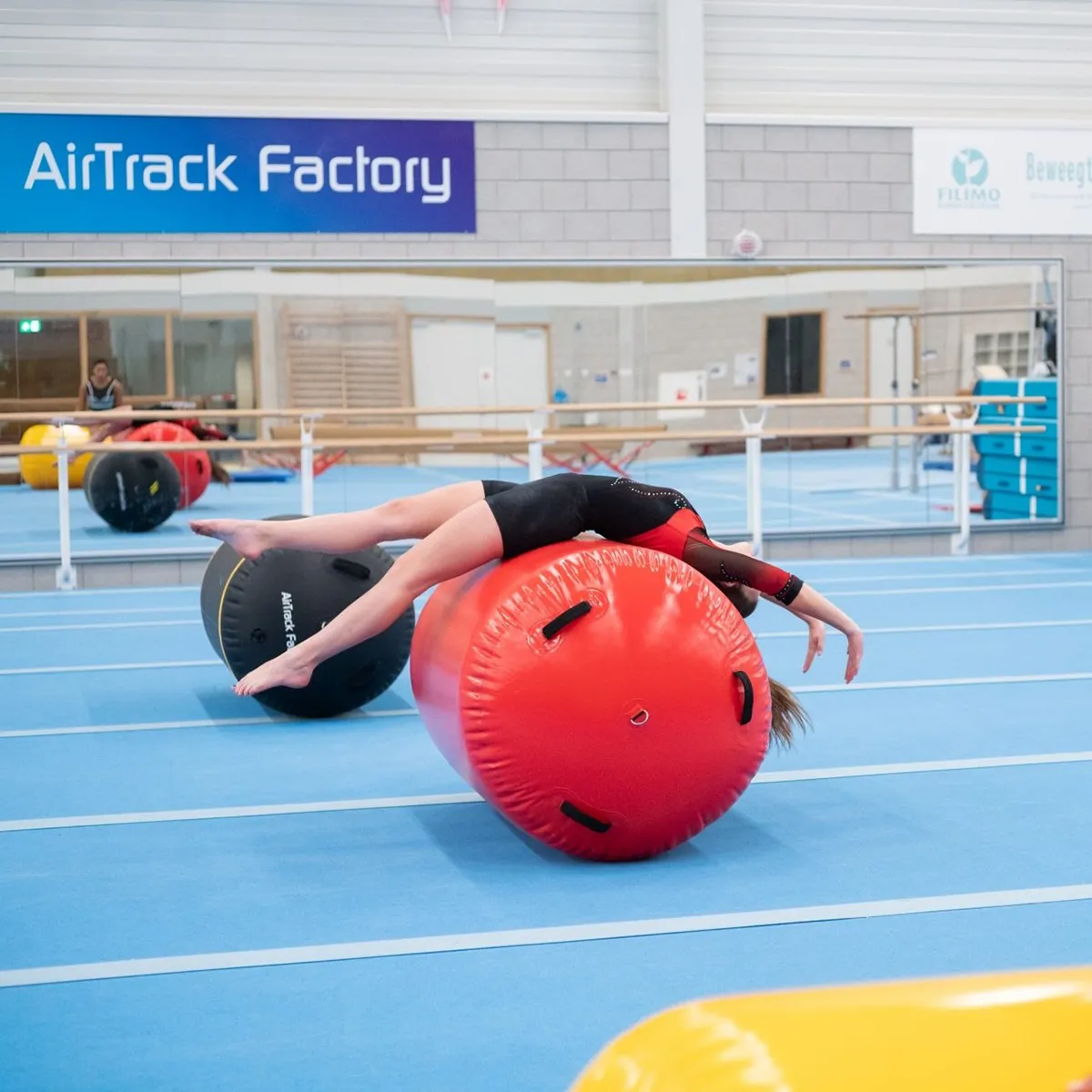 AirRoll L rosso Ø 90×120 cm per ginnastica | Conquest