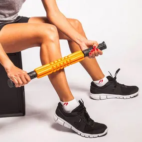 The Grid STK Trigger Point, roller miofasciale con impugnature, immagine con gambe